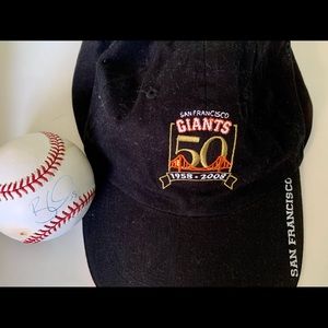 San Francisco Giants Brandon Crawford baseball and 50th anniversary cap.